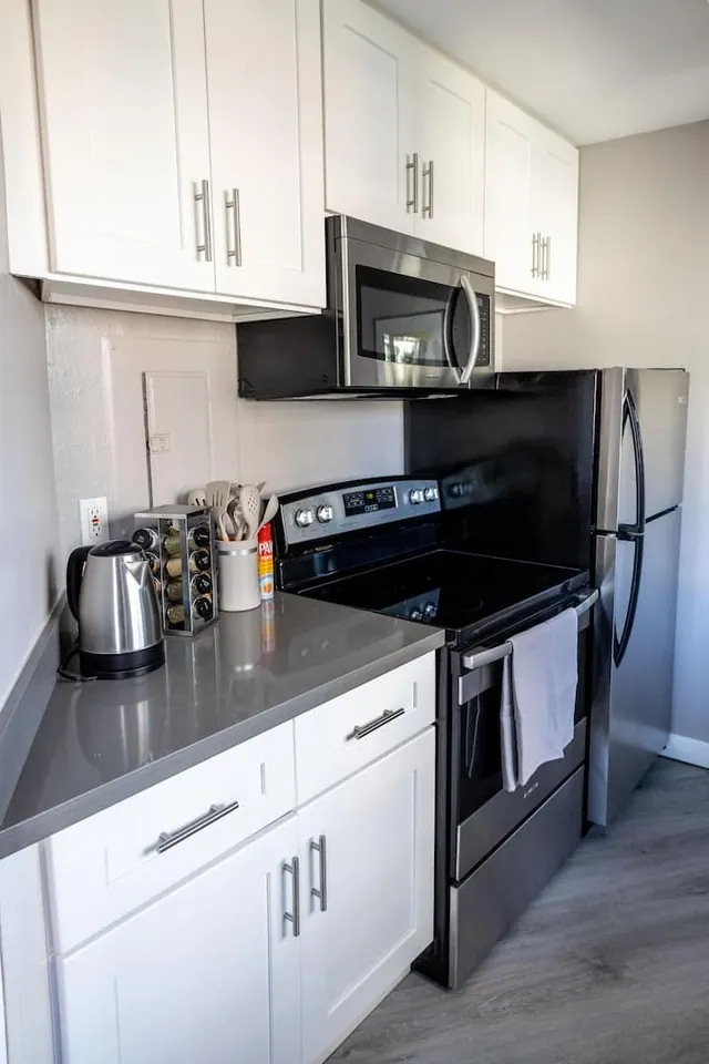 Kitchen with stove, oven and microwave