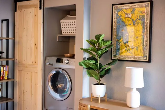 In-unit washer and dryer behind the barn door