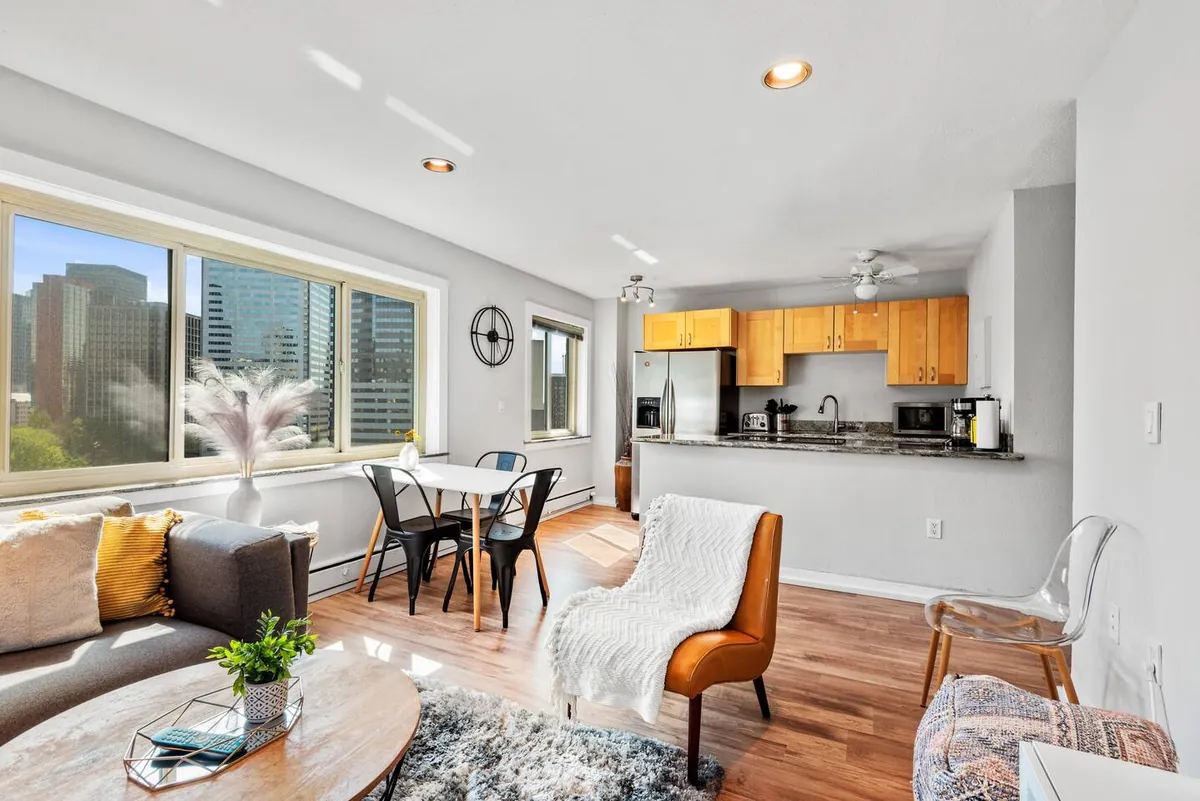 Living and dining area opening onto the kitchen