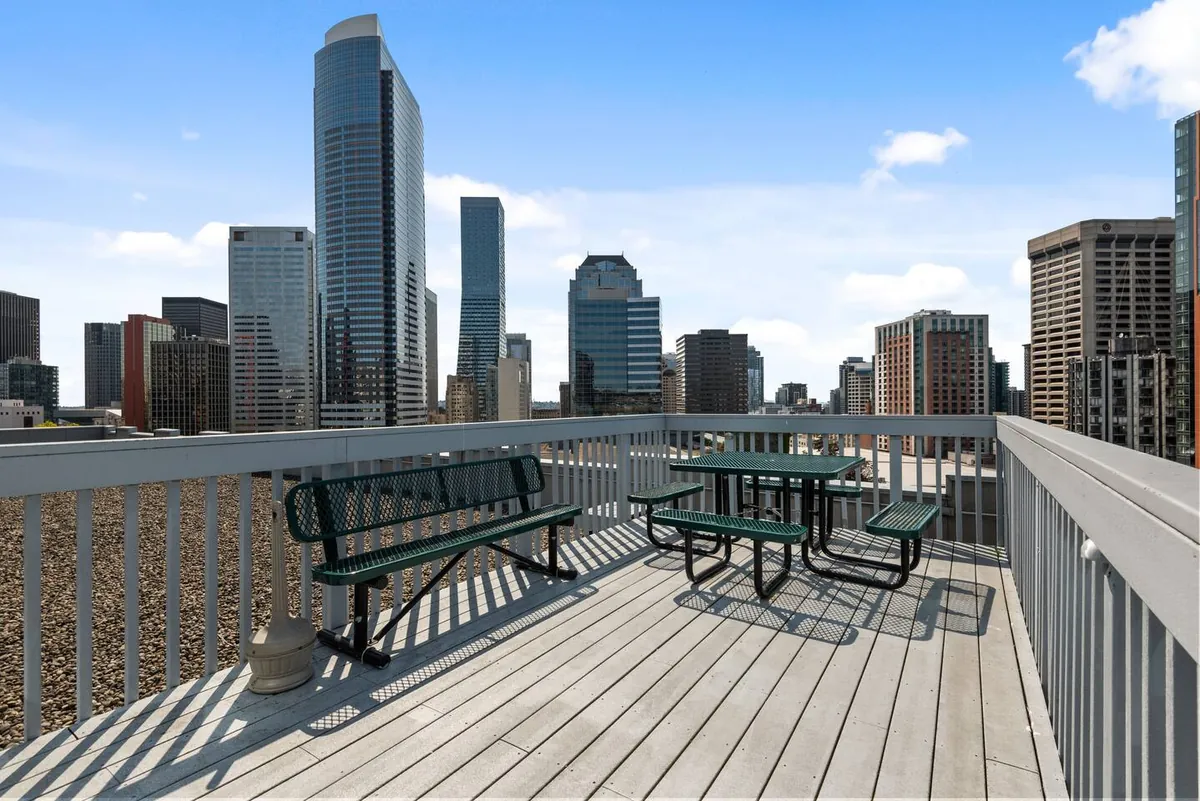 Shared rooftop deck with downtown Seattle skyline view